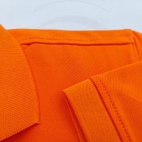 Chi tiết đường may áo thun cổ trụ polo bo trơn cá sấu lạnh màu cam