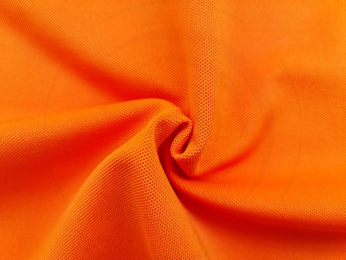 Chất vải áo thun cổ trụ polo bo trơn cá sấu lạnh poly thấm hút màu cam