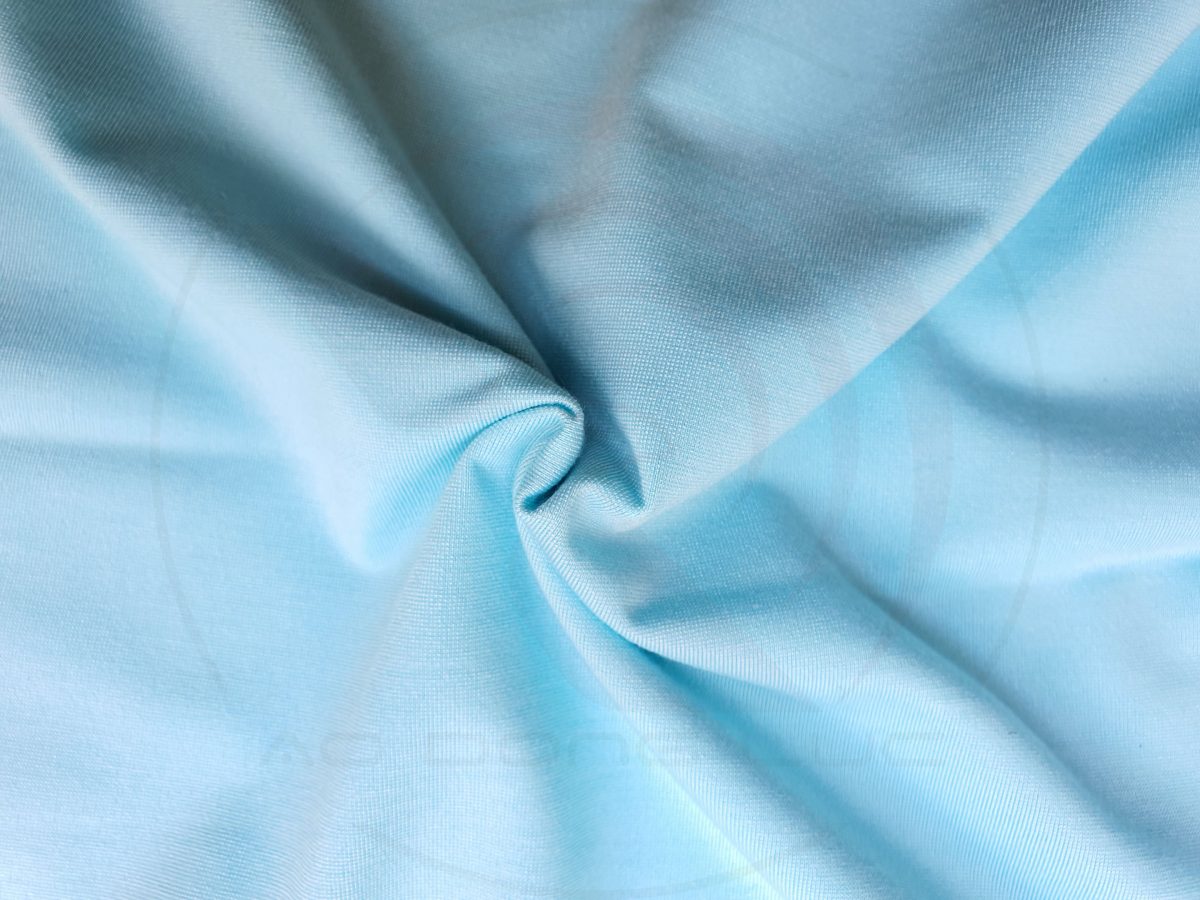 Hình chụp cận cảnh chất vải áo thun cổ tròn ngắn tay supe unisex màu xanh biển