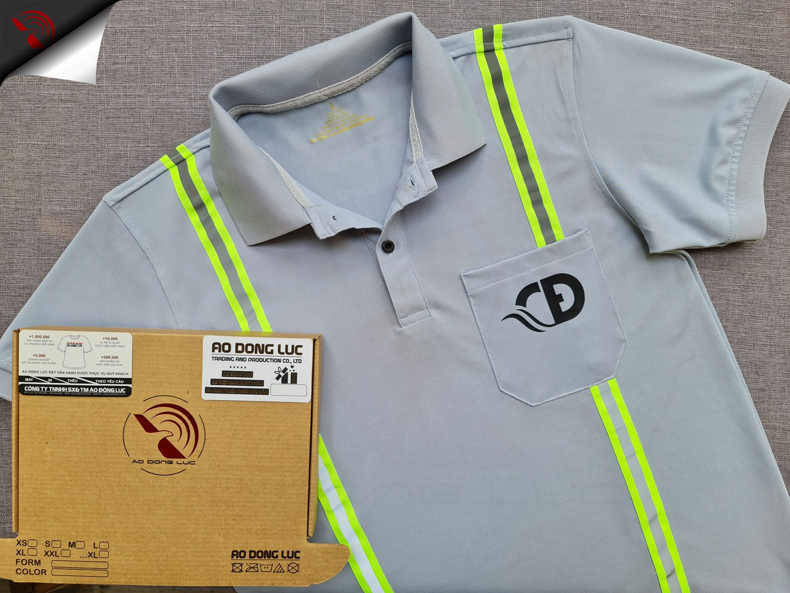 Đồng phục áo thun polo màu xám lam may phối dây quảng quang in kỹ thuật số
