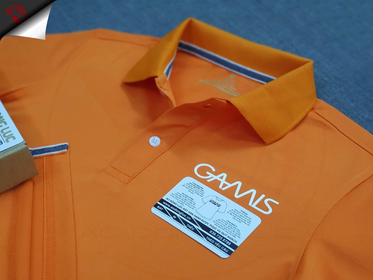 Đồng phục áo thun polo bo trơn màu cam in decal logo ngực