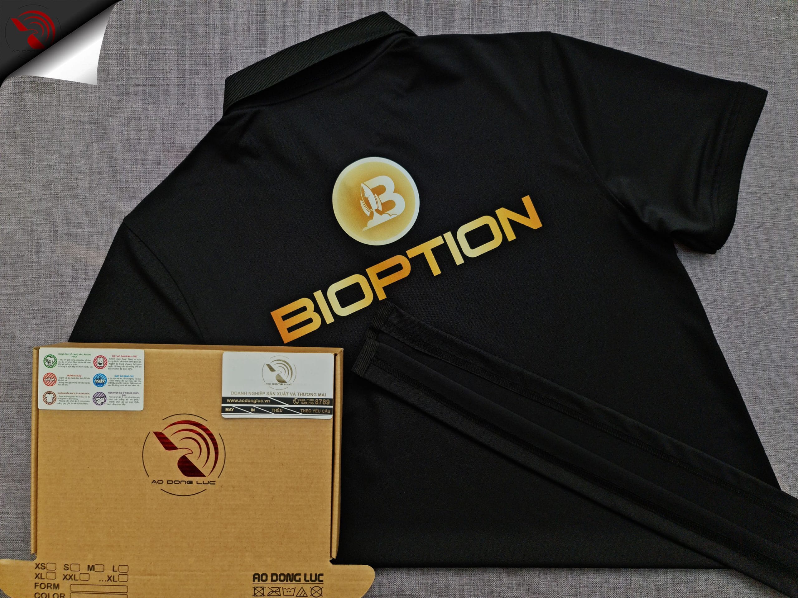 ao-polo-dong-phuc-mau-den-in-kts-3t-group-boption-sau Đồng phục áo thun polo bo trơn màu đen in kỹ thuật số logo