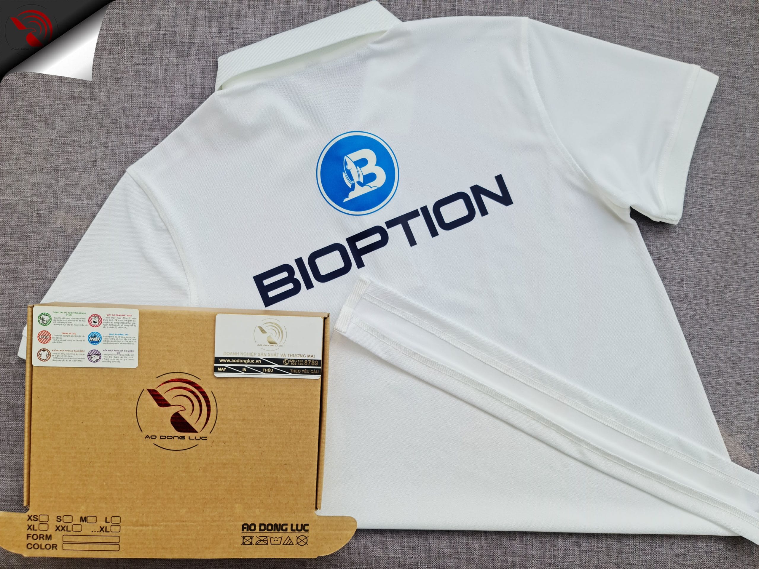 ao-polo-dong-phuc-mau-trang-in-kts-3t-group-boption-sau Đồng phục áo thun polo bo trơn màu trắng in kỹ thuật số logo