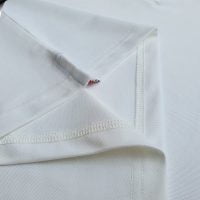 Hình chi tiết sản phẩm áo thun đồng phục polo bo sọc màu trắng
