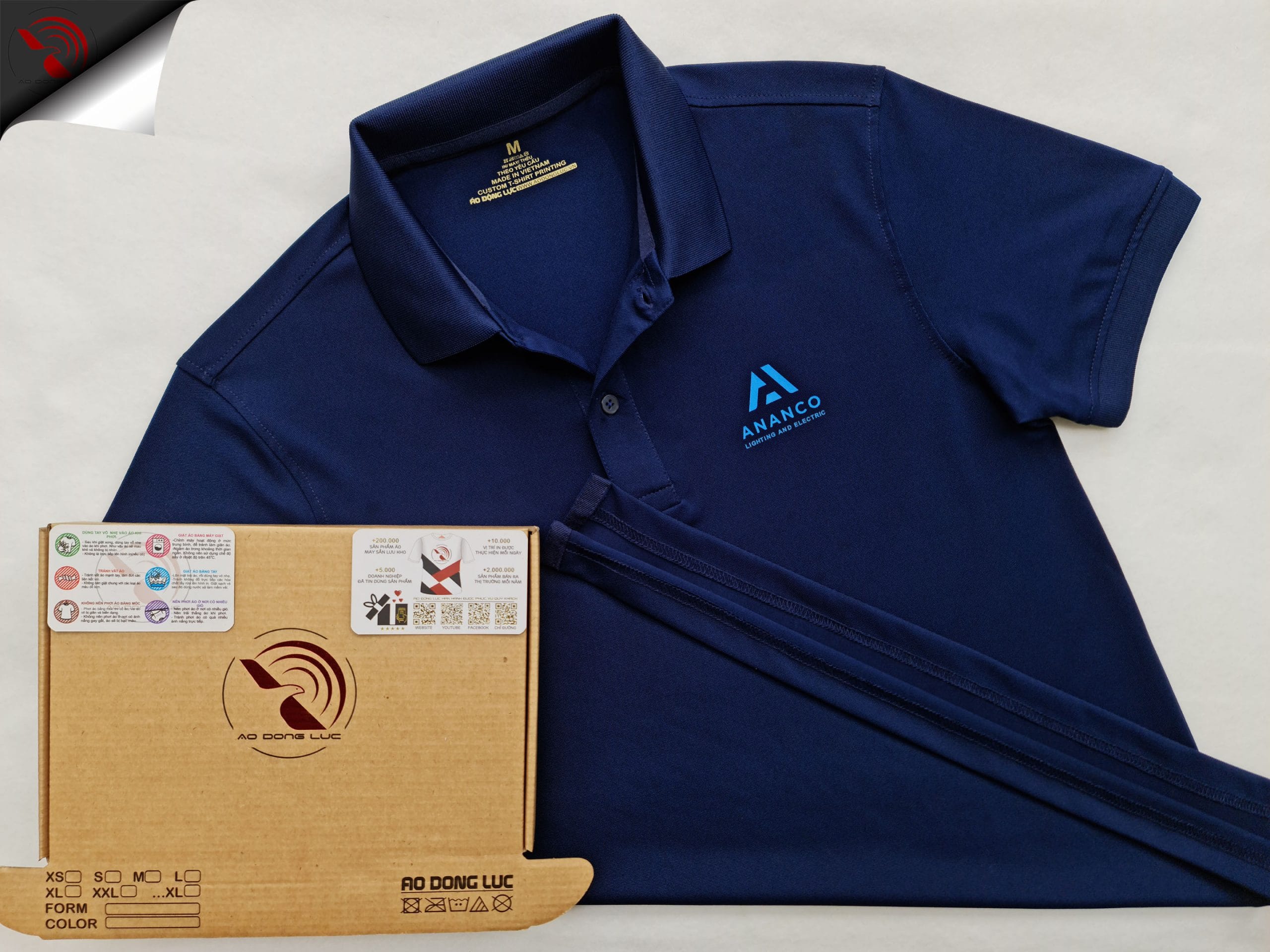 ao-polo-dong-phuc-xanh-den-in-kts-thiet-bi-dien-an-an-tr Đồng phục áo thun polo bo trơn xanh đen in kỹ thuật số logo