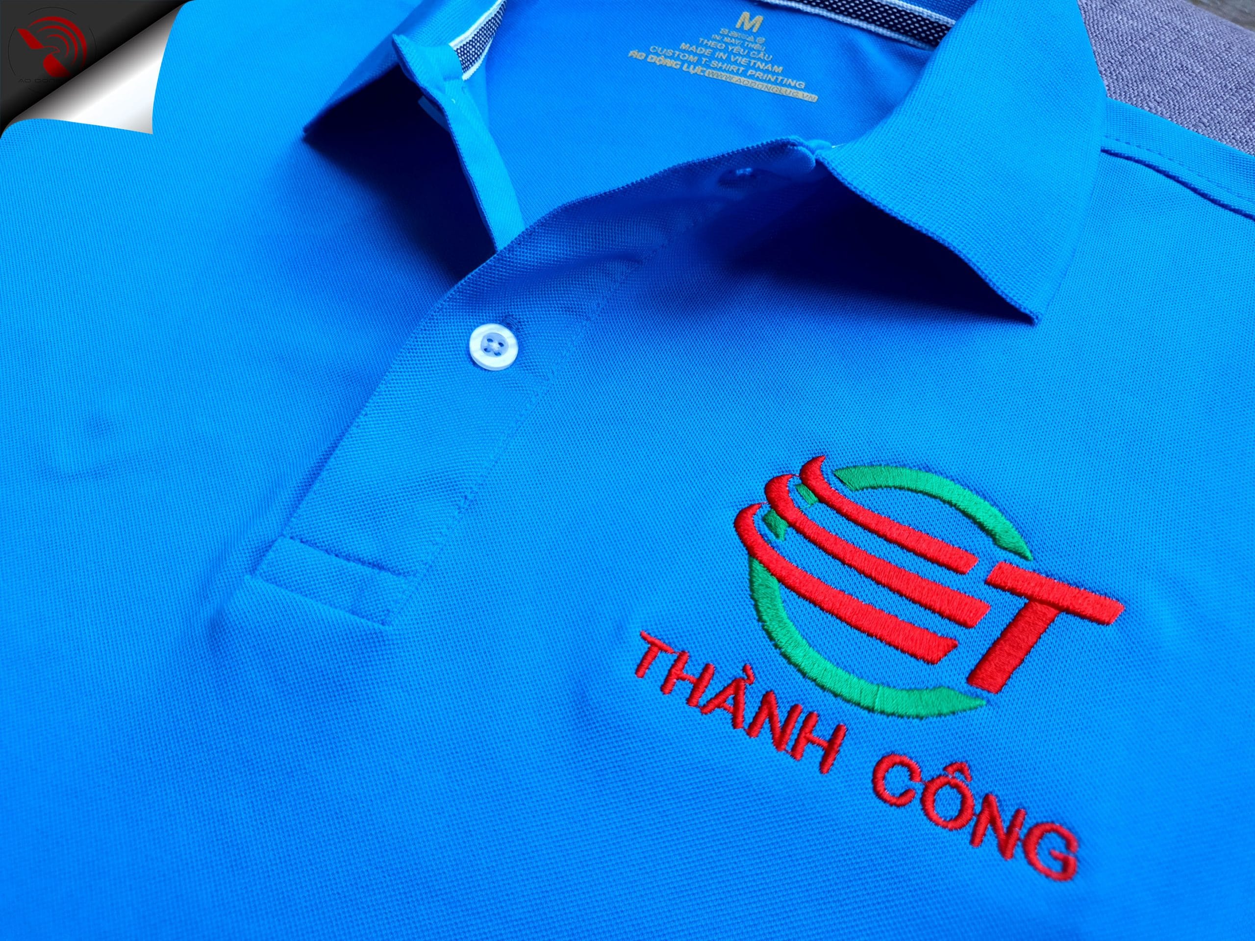 Thêu vi tính logo áo thun đồng phục