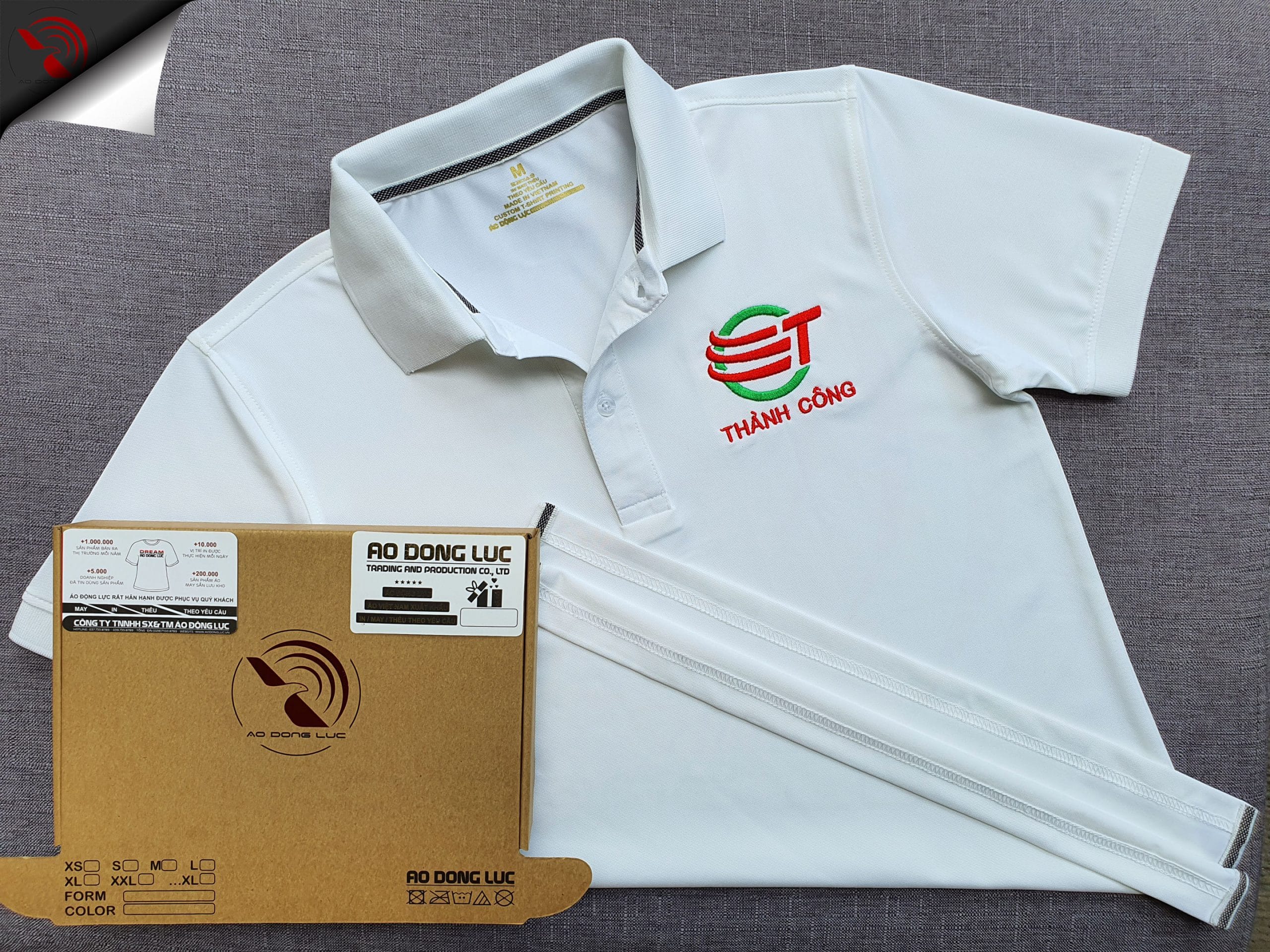 Đồng phục áo thun polo bo trơn màu trắng thêu logo