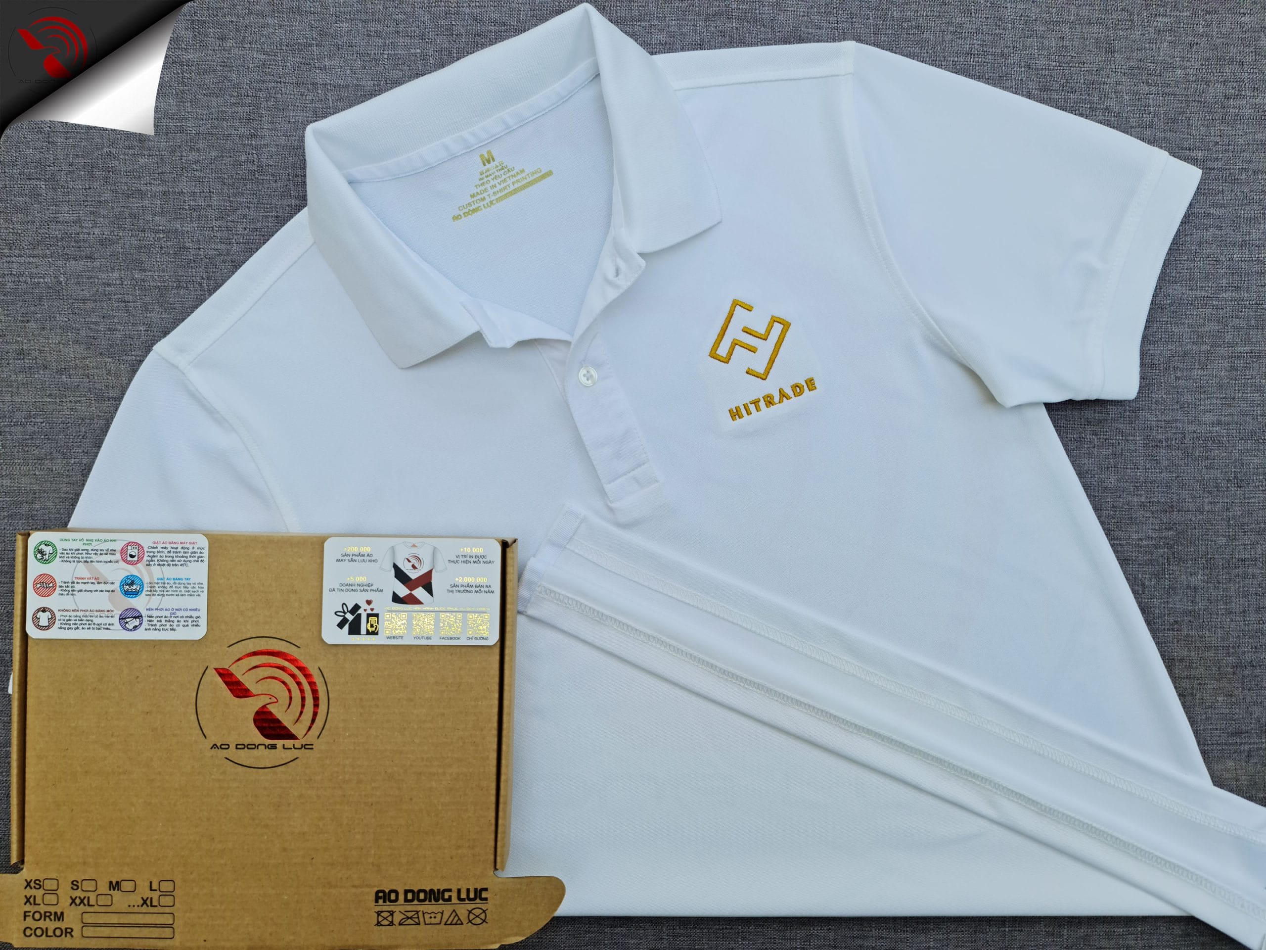 Đồng phục áo thun polo bo trơn màu trắng thêu logo