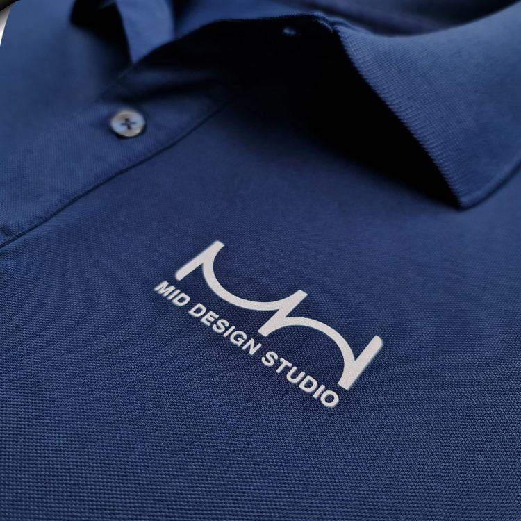 Đồng phục áo thun polo bo trơn xanh đen in kỹ thuật số logo