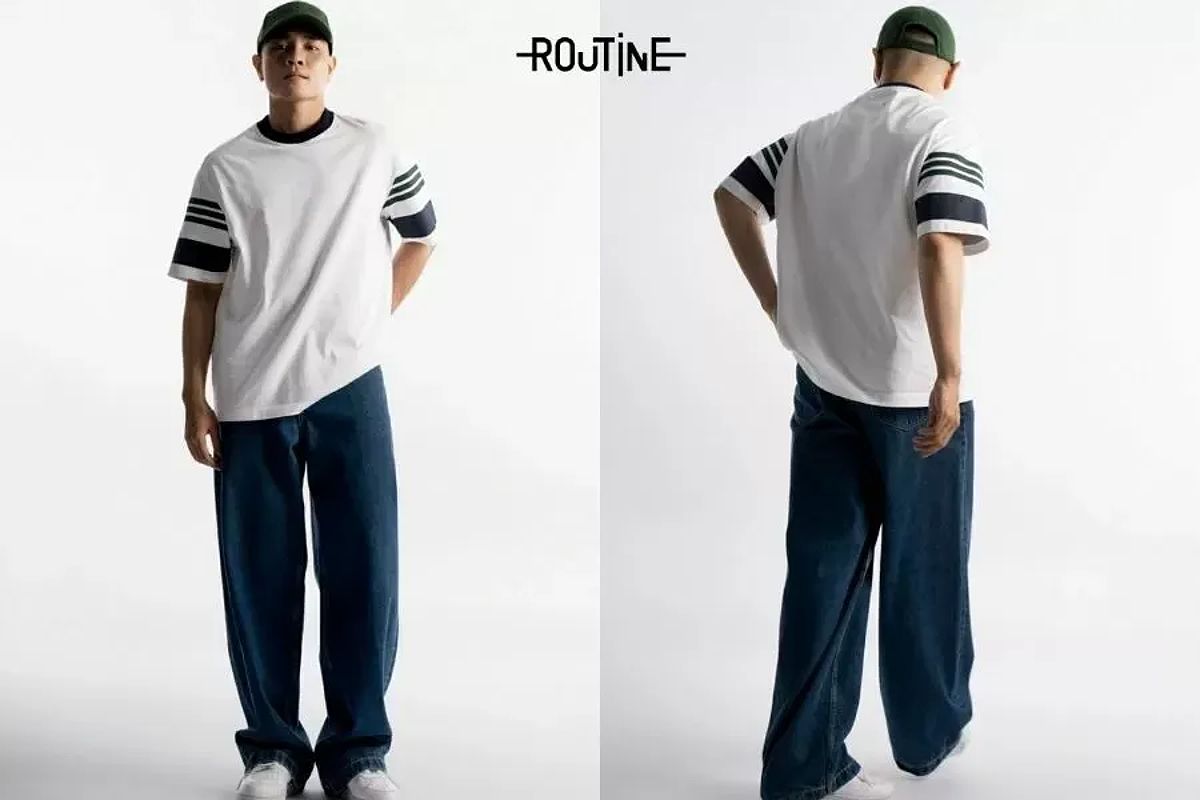 Áo thun phối sọc mix cùng quần jean ống rộng ấn tượng cho các bạn nam